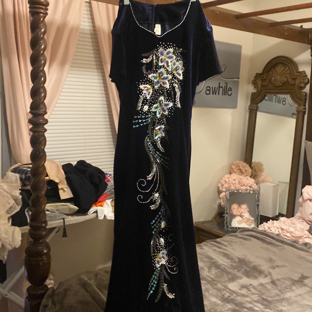 Beautiful hand stitched dress from Vietnam.